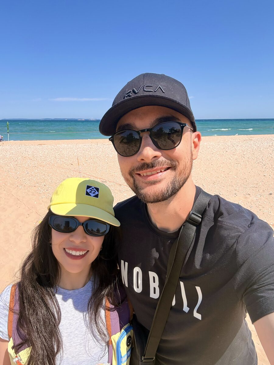 Karen with her partner at the beach